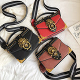 LEON EMBROIDERED CROSSBODY HANDBAG