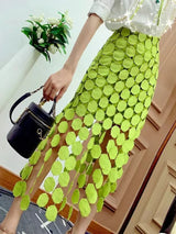 ASYMMETRICAL TASSEL SKIRT