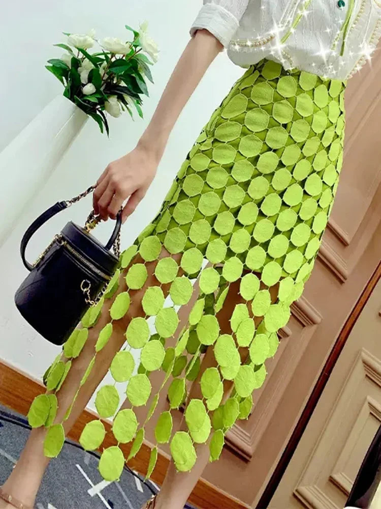 ASYMMETRICAL TASSEL SKIRT