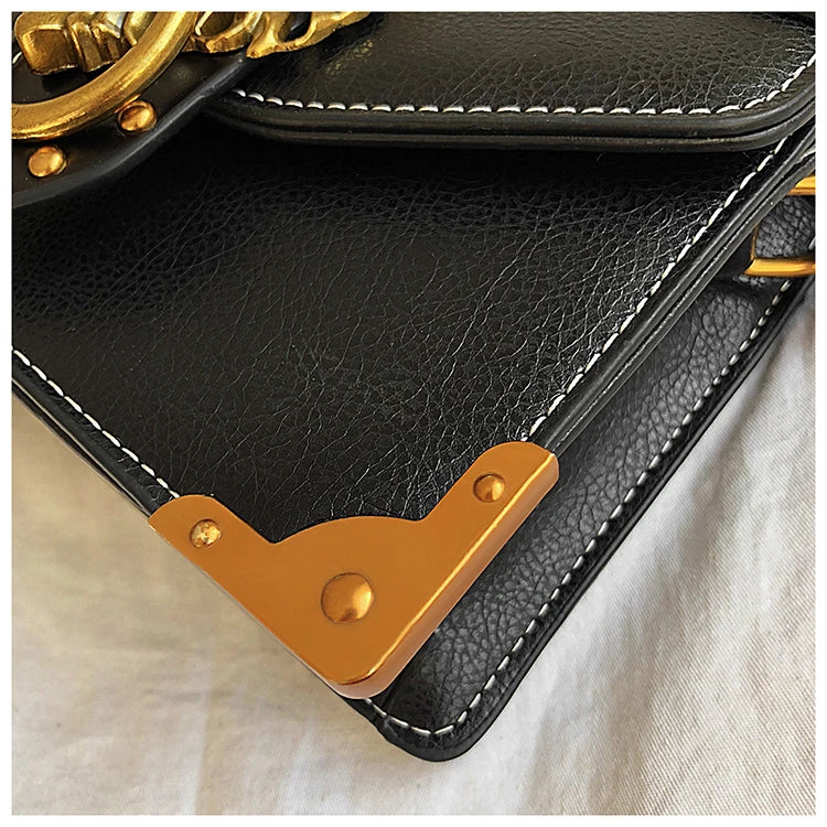 LEON EMBROIDERED CROSSBODY HANDBAG