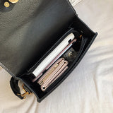 LEON EMBROIDERED CROSSBODY HANDBAG