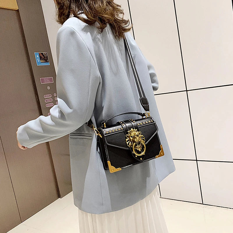 LEON EMBROIDERED CROSSBODY HANDBAG