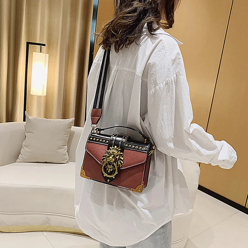 LEON EMBROIDERED CROSSBODY HANDBAG